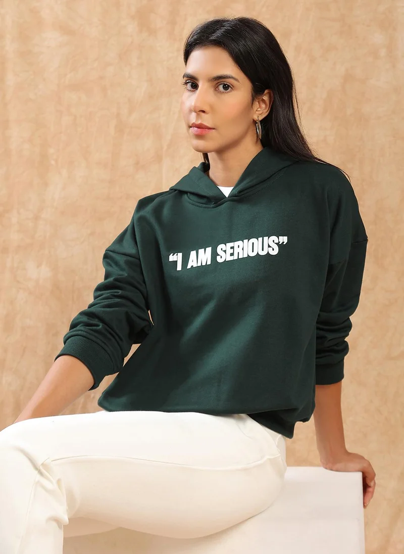 globus Globus Women Green Typography Print Drop Shoulder Sleeves Detail Hooded Ribbed Hem Pullover Oversized Sweatshirt (Fleece 260-280 GSM)